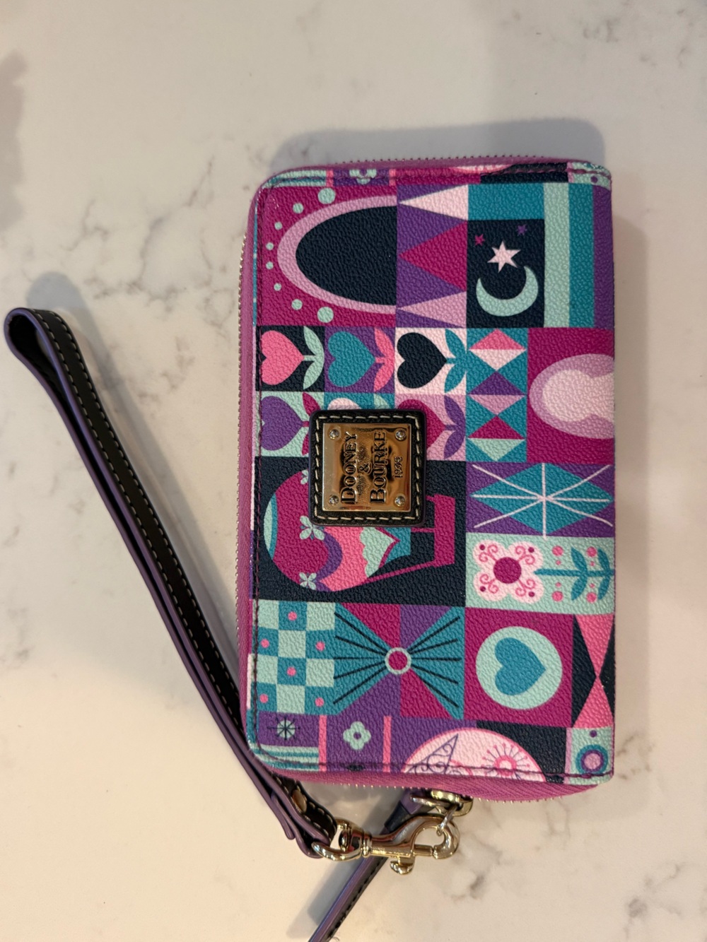Dooney & Bourke x Disney It’s Small World Multicolor Purple Patchwork Wristlet